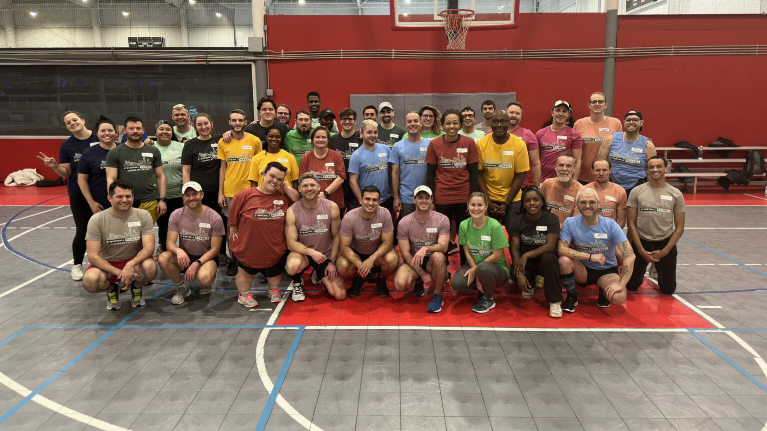 Group of indoor kickball players